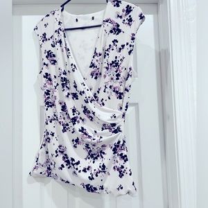 Floral print size small from White House black market. White purple and black